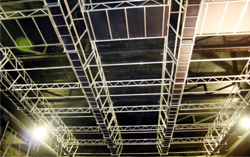 Aluminium trussing structure with interconnected square and rectangular sections, designed for event rigging and stage support in professional product.