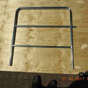 Aluminum hand railing section with horizontal bars, designed for safety and support in event and construction applications, mounted on a wooden surfac.
